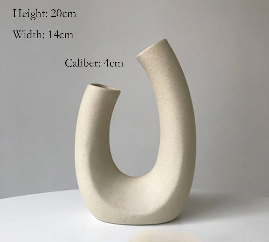 Dimension diagram of the tall beige sculptural U-shaped vase