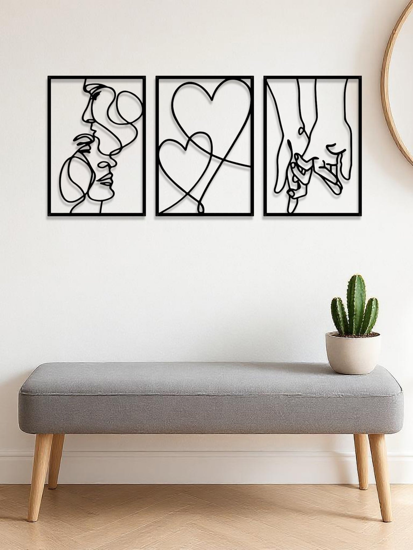 Romantic line art metal panels above a grey upholstered bench