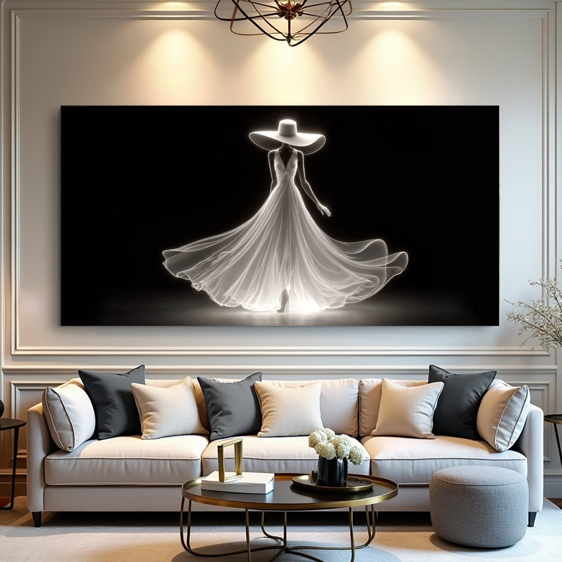 Elegant white woman-in-a-gown silhouette canvas art on black, hung above a light sofa in a living room