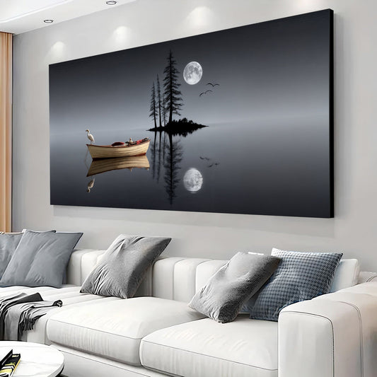 Night lake canvas art styled above a cream sofa in a modern living room