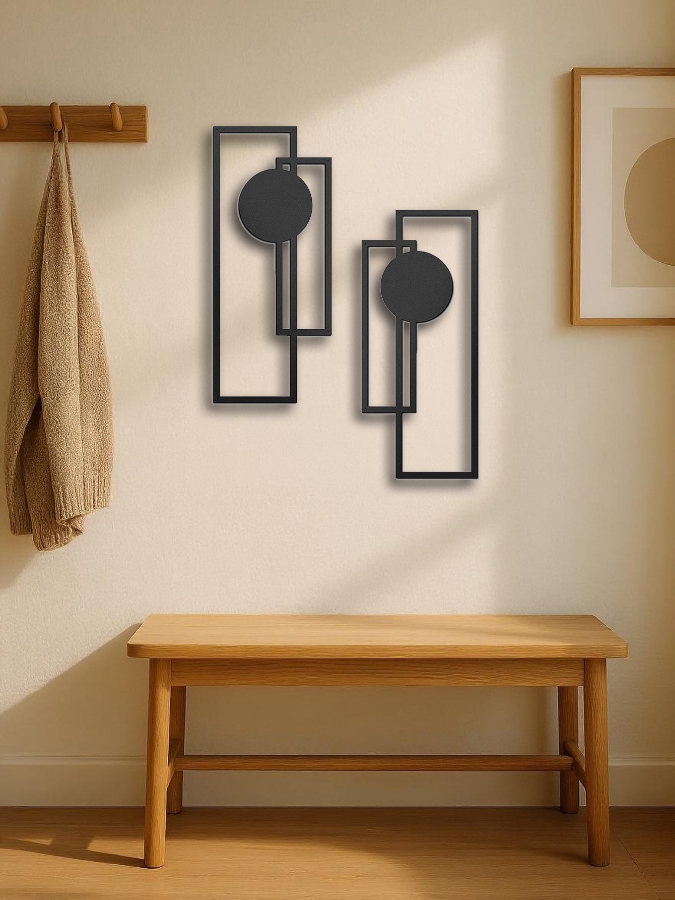 Sculptural metal pieces above a refined wooden bench