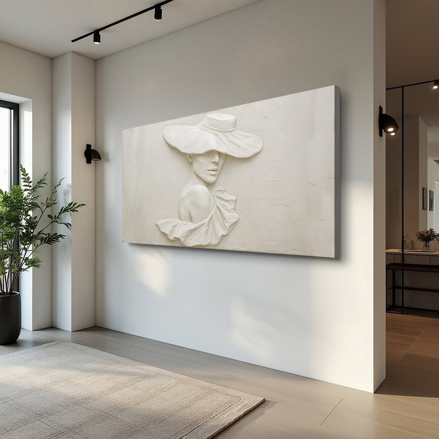 Female portrait wall art displayed in a bright modern living space