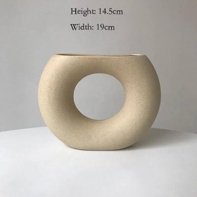 Dimension diagram of the beige sculptural round donut vase