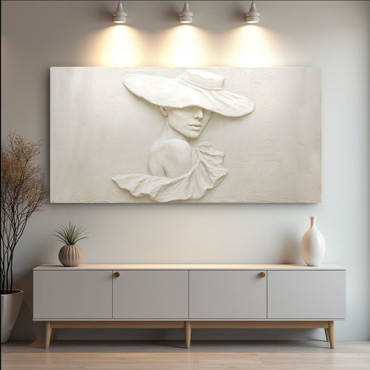 Textured female portrait wall art with hat detail above a minimalist credenza