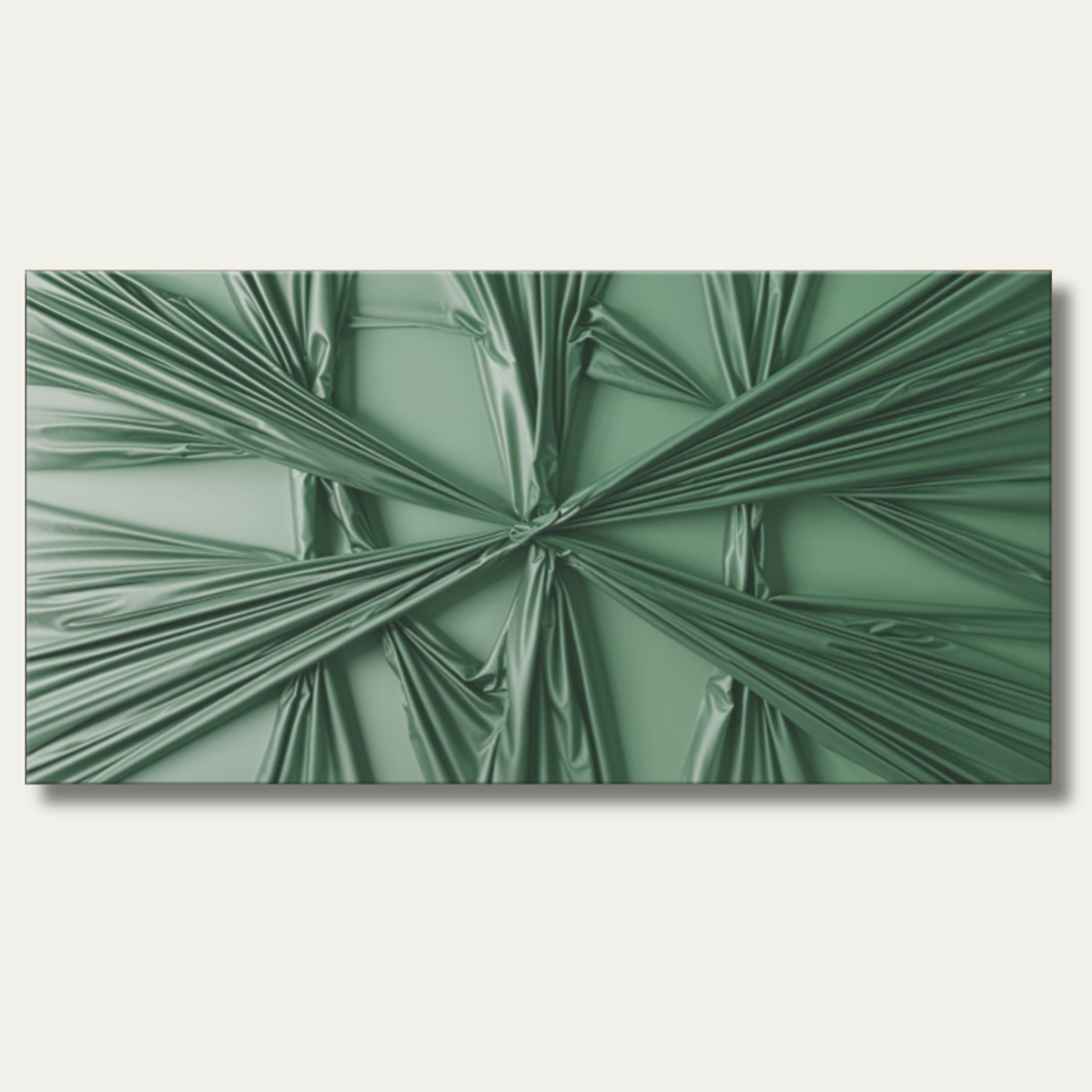 Emerald green draped sculptural canvas wall art on a warm cream wall